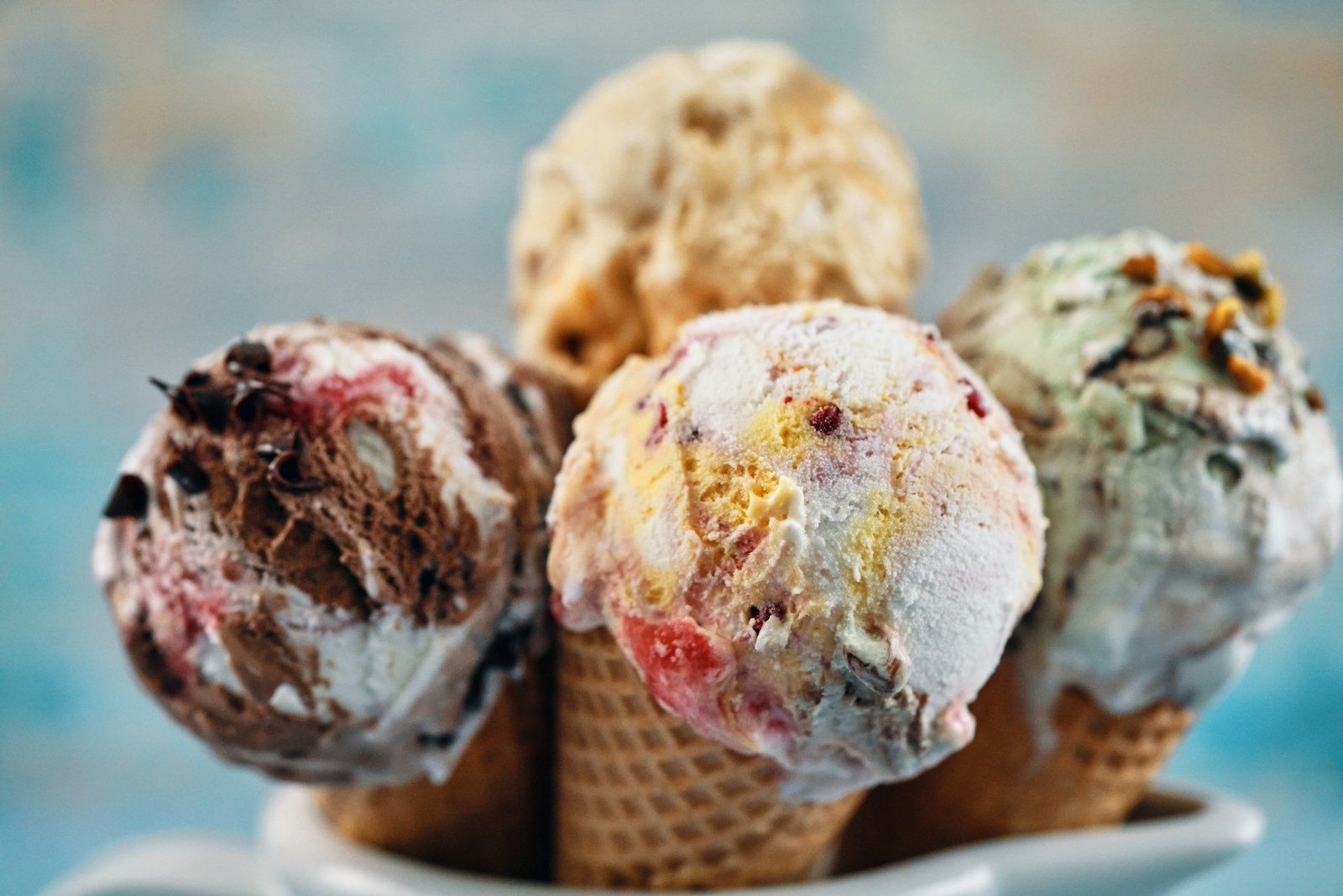 Pistachio, Chocolate, Strawberry and Vanilla Ice Cream in a Cone